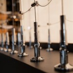 Like the soffits above, the tension sets on the bottom part of this cable rack were also anchored onto a plywood base.