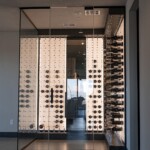 Because of the cable racks, the bottles don't look like bottles at certain angles from afar, making the cellar look all the more interesting.