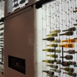 Cachet Wine Cellars purposefully designed the ball joints to stay a little loose so they're able to cradle the bottles and keep them in place even with slight movements.