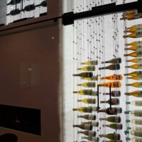 Some of our racking designs are custom-made according to your preferences, providing even more uniqueness and detail. cable wine display and construction LED lighting