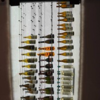 This triple deep cable wine rack is designed to store wine in a contemporary manner, eliminating the need for bins or or traditional wine racks. cable wine racking column with triple deep design